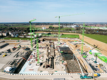 As Green as it Gets &ndash; Six WOLFF Cranes Move 60.000 Cubic Meters of Concrete for the Memmingen Hospital
