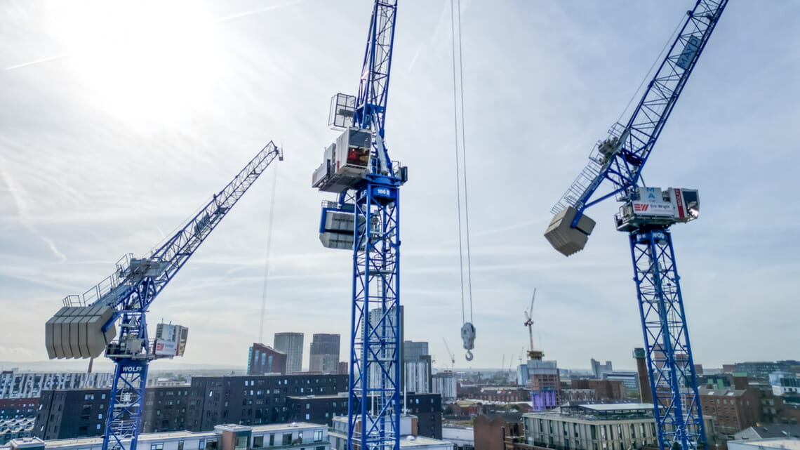 Three WOLFF 166 B tower cranes are supporting construction at Phoenix Iron Works in Ancoats, Manchester, UK