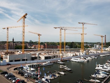 Les grues WOLFF jaunes construisent un quartier bleu en Flandre !